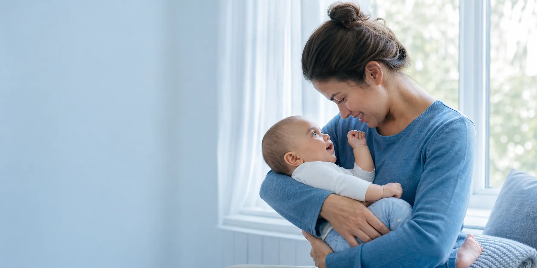 Parent sharing a warm moment with their young baby